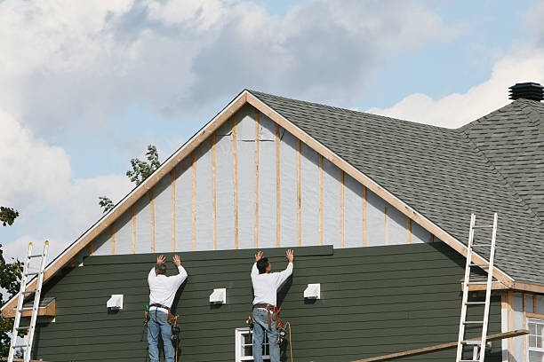 Professional Siding Replacement technician working in Belmont, OH